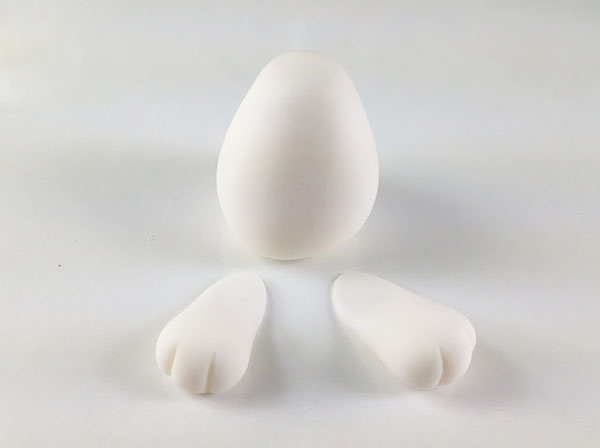 Прорізи на задніх лапках кролика з мастики