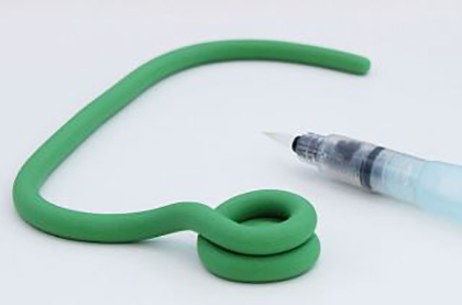 Приготування ялинки з довгої ковбаски мастики