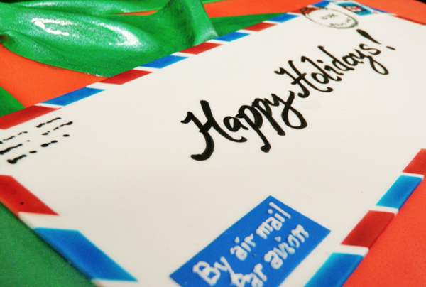 Вітальні новорічні написи на конверті з мастики